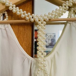 White top with pearls.